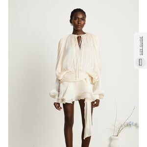 Viral Miss Rosier EUGÉNIE FULLY-PLEATED RUFFLED MINI DRESS IN NEUTRALS
